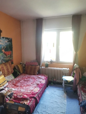 Camera de închiriat în apartament