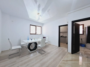 Aproape de benzinaria ESO. Ideal ca investitie. 10 locuri de parcare private.