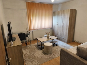 Dau în chirie garsonieră amenajată confort I la parter 4 în bloc de garsoniere în cartierul Dâmbul P - imagine 2