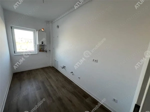 Garsoniera de 41 mp balcon parcare zona Brana Selimbar - imagine 4