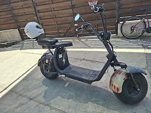 vand scuter electric in stare buna de functionare.functioneaza tot pe el..