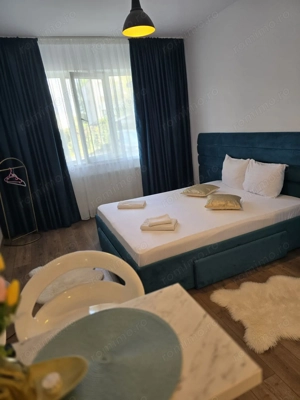 Garsoniera în Micro 40,parter,mobulata,utilata