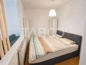 Garsoniera de vanzare 47 mp utili cu o mica gradina de 17 mp - imagine 3