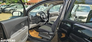 Daihatsu Sirion 4x4  an 2009 motor 1300 cm3 benzina clima  - imagine 5