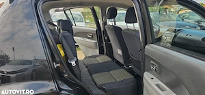 Daihatsu Sirion 4x4  an 2009 motor 1300 cm3 benzina clima  - imagine 9