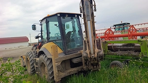 Vand Buldoexcavator CATERPILLAR - imagine 2