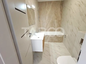 Apartament 3 camere decomandat - 2 bai - balcon - parcare - intabulat - imagine 3