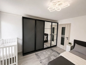 Garsonieră  modernă, ultrafinisată   complet mobilată   32 mp - imagine 4