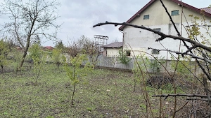 Teren intravilan construibil intre case .