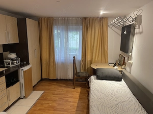 Închiriez GARSONIERĂ cochetă 