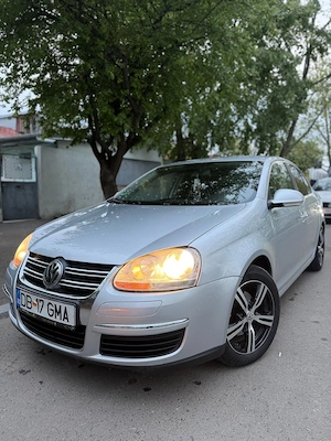 Vw jetta 1,9 tdi 2008 - imagine 12