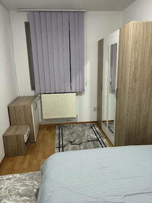 închiriez apartament - imagine 2