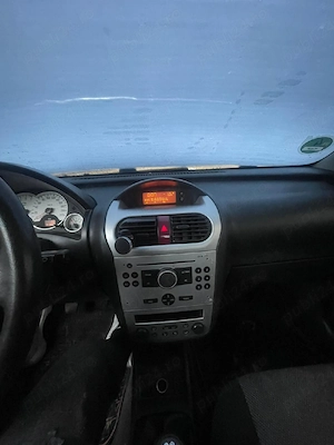 Opel corsa 2006 - imagine 2