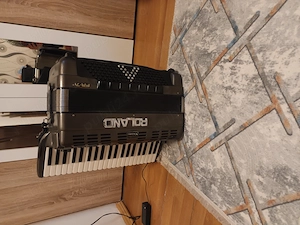 Vând acordeon roland fr7 