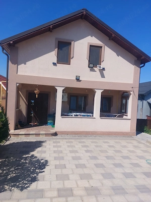 Vând casa in Caracal Str.Targul Nou, 120 mp construcție (2 camere , living + dressing)+foisor - imagine 4