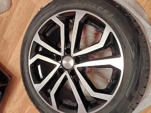 Set Jante aliaj Dezent 17 inch + anvelope dimensiune 215/50/ R17. Distanta între prezoane este 105 m - imagine 2