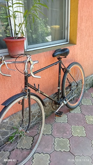 Vind bicicleta semicursiera 