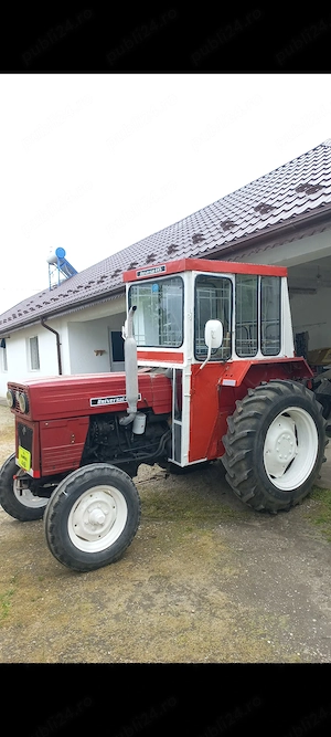 Tractor U445 cu plug de Craiova si remorca monoax de Medgidia