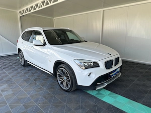 BMW X1 Hibrid 2.0 Diesel 140 CP An 2011 - imagine 8