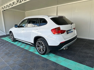 BMW X1 Hibrid 2.0 Diesel 140 CP An 2011 - imagine 9