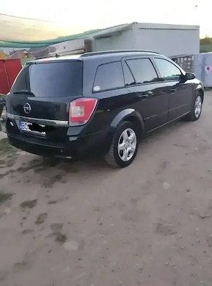 Opel Astra H station wagon 1.9 cdti an 2008 - imagine 3