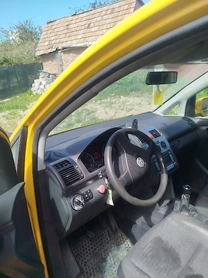 vw Touran 1.9 tdi autoutilitara 2009 - imagine 2
