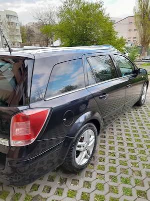 Opel Astra H 1.9 cdti  - imagine 4
