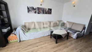 Casa de vanzare 91mp 4 camere mobilate utilate 2 bai garaj Turnisor