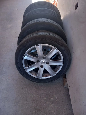 Set jante aluminiu si cauciucuri Peugeot 16 inch cu 4 prezoane - imagine 2