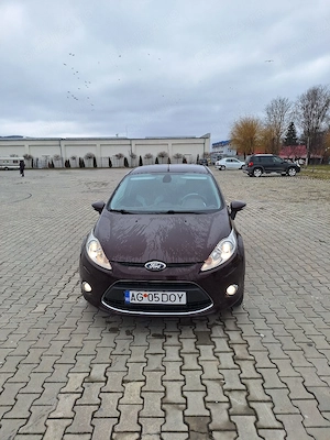 Ford Fiesta Titanium 2009, piele,climatronic,incalzire scaune,2 seturi roti !!  - imagine 10