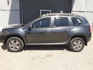 Dacia Duster 2015 - diesel -bine întreținută -228.469 km -7.200   negociabil! - imagine 2