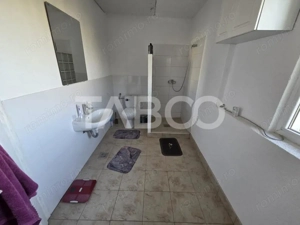 Casa de vanzare zona Negoiu 4 camere 208 mp utili si curte 550 mp - imagine 13