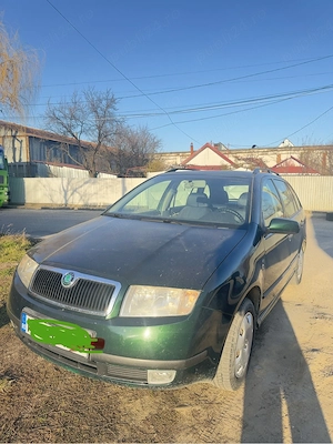  koda Fabia Combi de primă generație, finisată în nuanța verde închis. - imagine 3