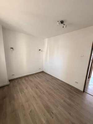 Inchiriez apartament spatios zona ultracentrala - imagine 10