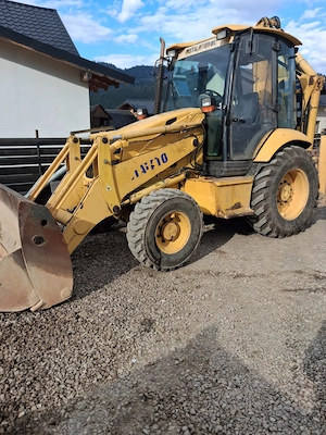 Buldoexcavator Komatsu  - imagine 2