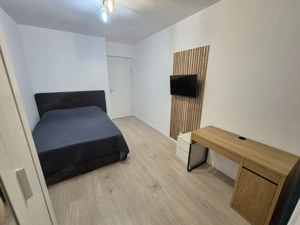 Închiriere Apartament cu 2 camere bloc nou, parcare inclusă, centrala