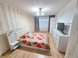 Închiriez apartament spațios Calea Moldovei,lângă Hotel Diana,parter,parcare inclusă