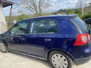 Vând golf 5,dublu climatronic.