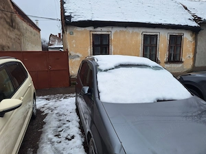 Steaua,teren cu casa demolabila,suprafata 550 mp,str Bujorilor nr 27,casa din fata+teren aferent