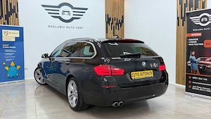 ** BMW Seria 5 ** - imagine 6