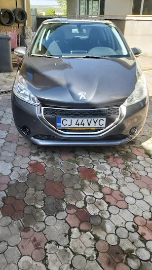 peugeot 208 1.4hdi,104000km,an 2014 - imagine 6