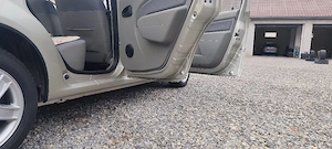 Dacia Logan 1.6 MPI - imagine 9