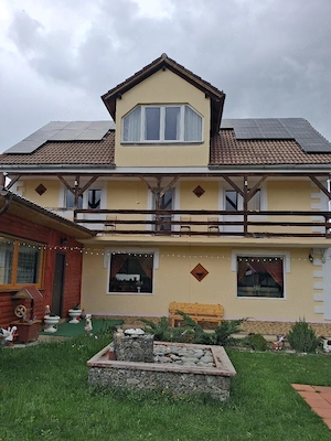 vand casa pensiune