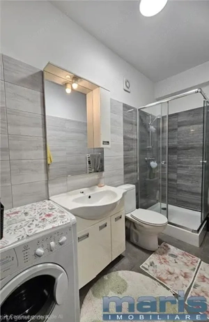 Tudor bloc nou 2 camere modern, parcare proprie - imagine 7