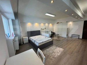 Garsoniera de inchiriat, 38 mp, open space, centrala proprie, Calea Bucuresti