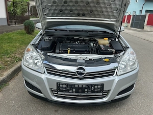 Opel Astra 1.6 Benzina 116 Cp  an 2009 - imagine 10