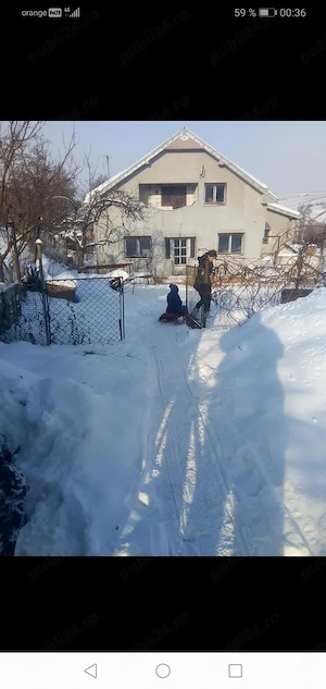 Vând casa ridicata plus teren 