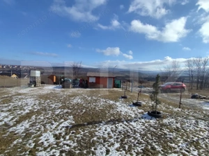 Cabana de lemn cu  700mp intravilan, Ciurea
