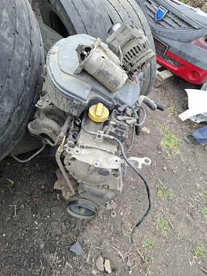 vand motor 1.4 benzina dacia logan 1 an 2005 perfect functional km putini - imagine 4