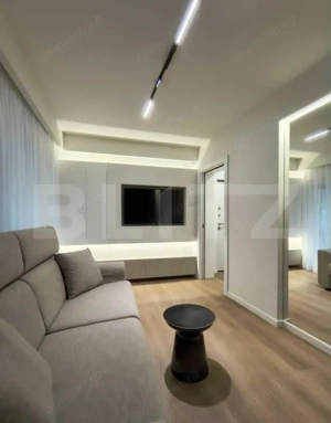 Garsoniera de inchiriat -LUX- in zona centrala - parcare inclusa